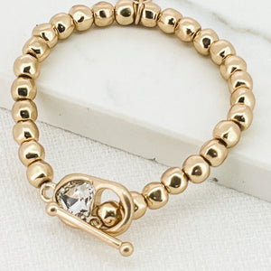 ENVY MUTED GOLD BRACELET WITH GEM HEART