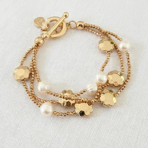 ENVY TRIPLE STRAND PEARL & FLOWER BRACELET
