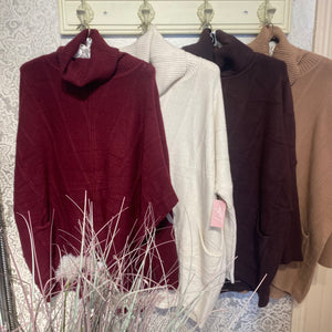 CABLE V FRONT ROLL NECK KNIT